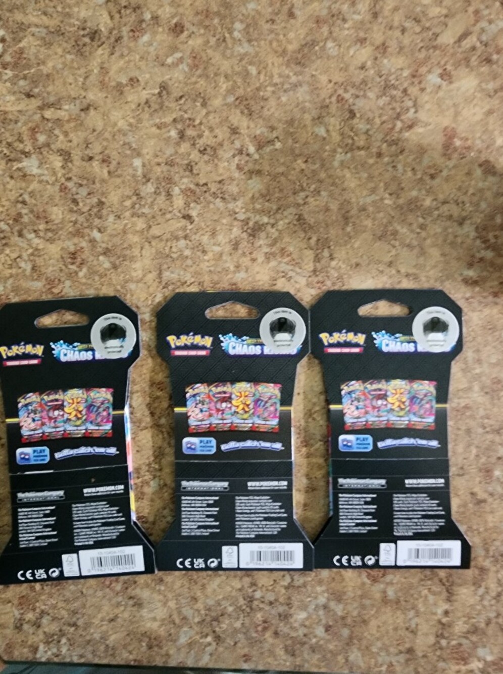 Pokémon TCG: The  Chaos Rising (3 Packs) - Black with Multicolor Art